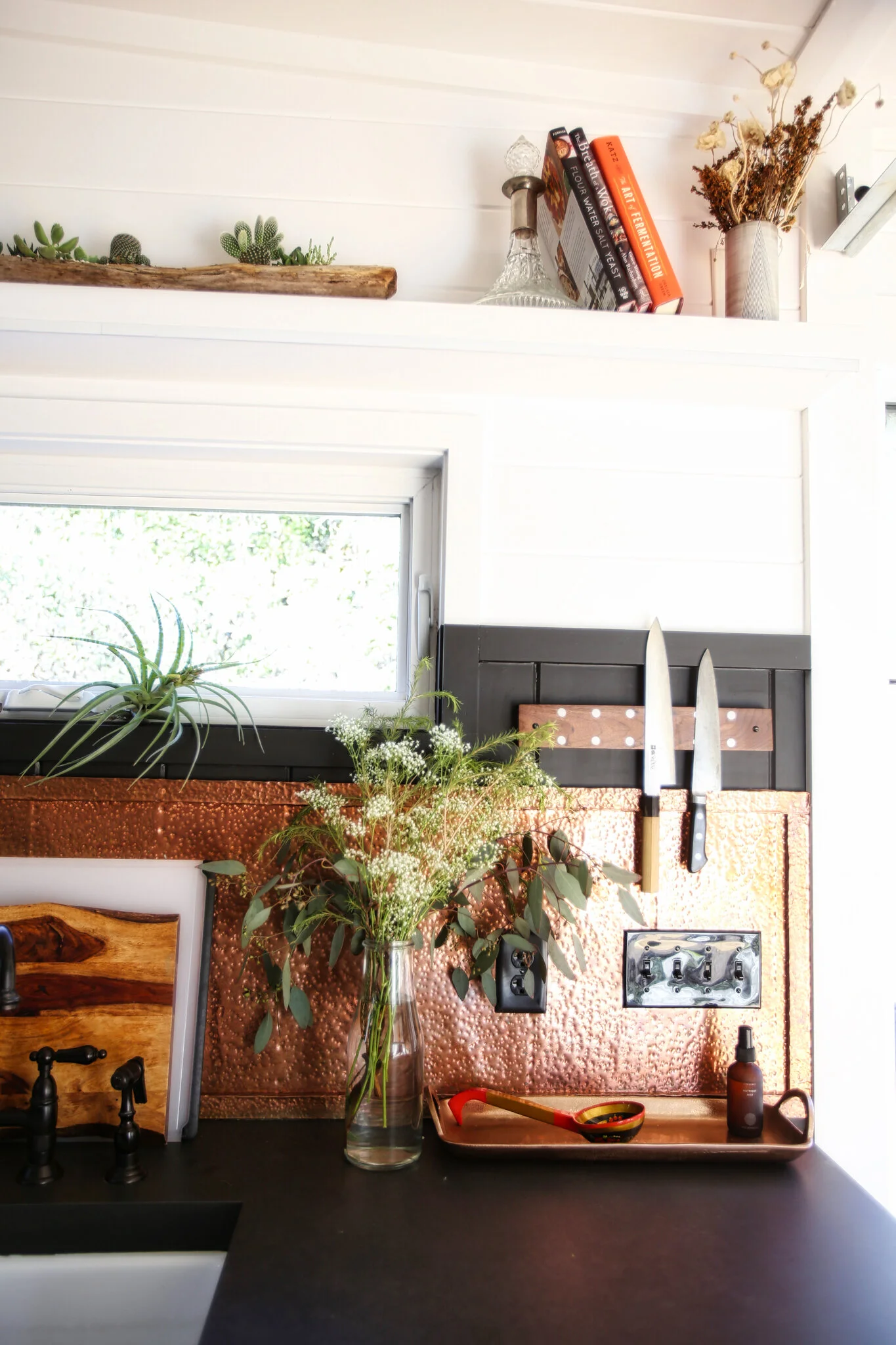 A well-maintained chef's knife on a cutting board